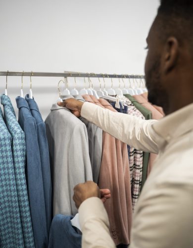 close up man shopping clothes