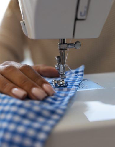 front view woman repairing clothes front view woman repairing clothes